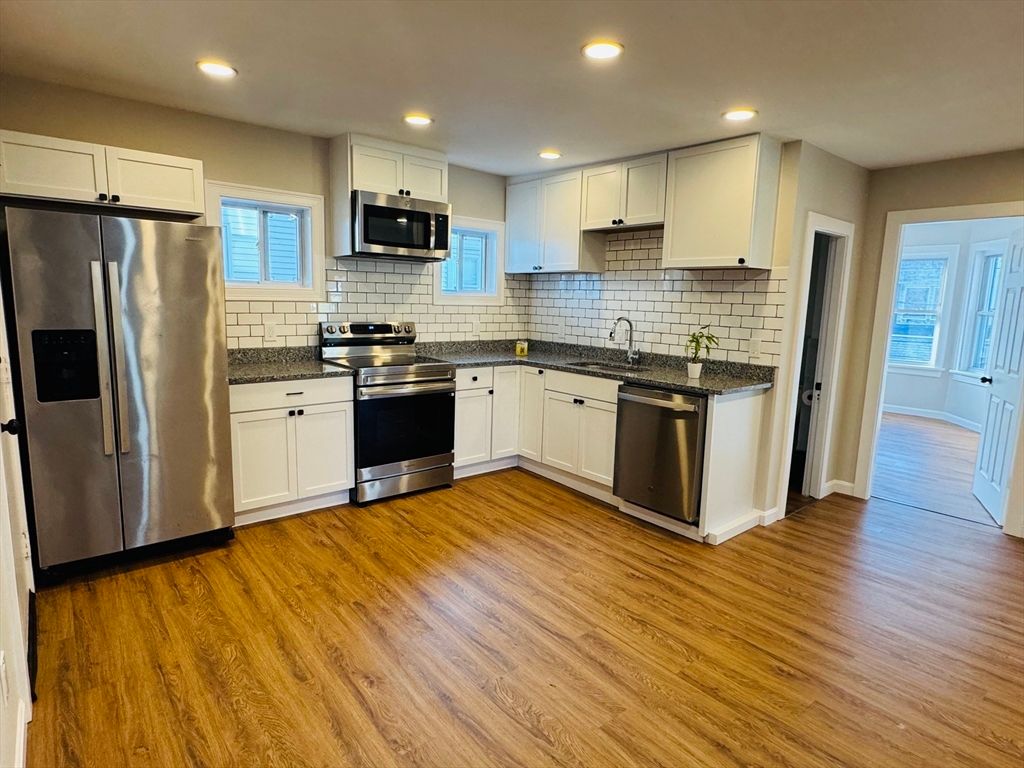 Interior, Kitchen, Recessed Lighting, Stainless Steel Appliances, Wood Texture Flooring