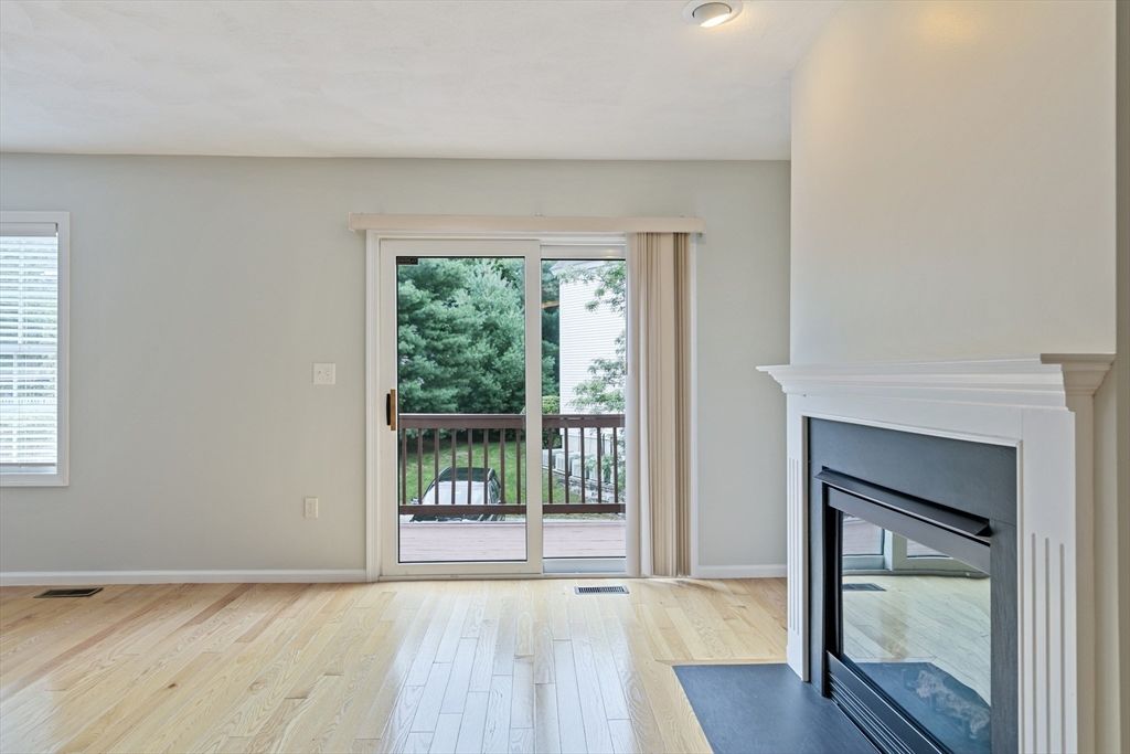 Empty room, Fireplace, Interior, Recessed Lighting, Wood Texture Flooring