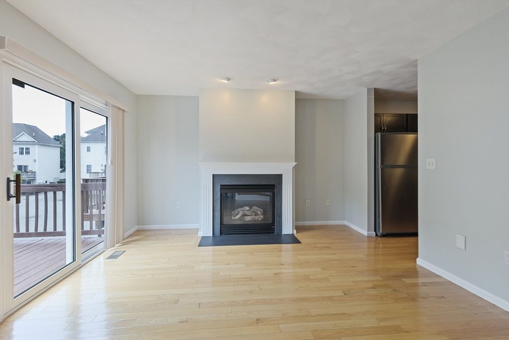 Empty room, Fireplace, Interior, Recessed Lighting, Wood Texture Flooring