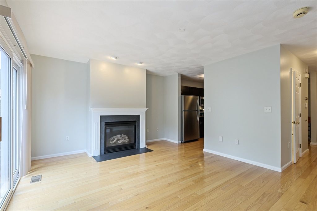 Empty room, Fireplace, Interior, Recessed Lighting, Wood Texture Flooring