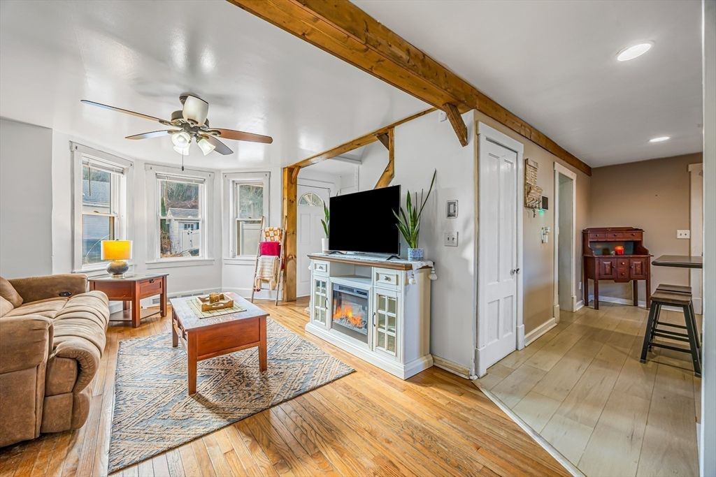 Fireplace, Interior, Living room, Recessed Lighting, Wooden Beams, Wood Texture Flooring