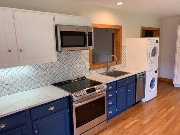 Interior, Kitchen, Recessed Lighting, Stainless Steel Appliances, Washer, Wood Texture Flooring