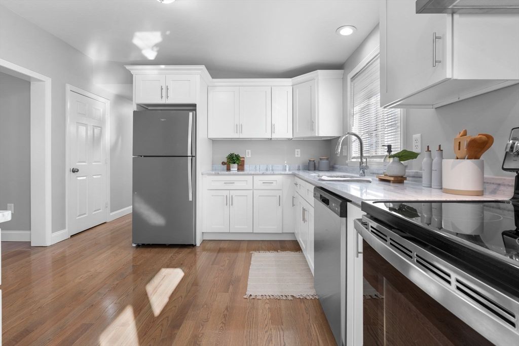 Interior, Kitchen, Recessed Lighting, Stainless Steel Appliances, Wood Texture Flooring