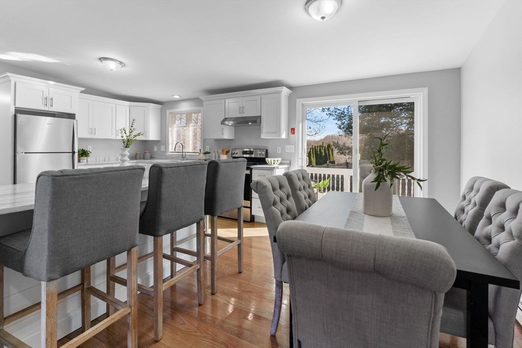Dining room, Interior, Kitchen, Recessed Lighting, Stainless Steel Appliances, Wood Texture Flooring