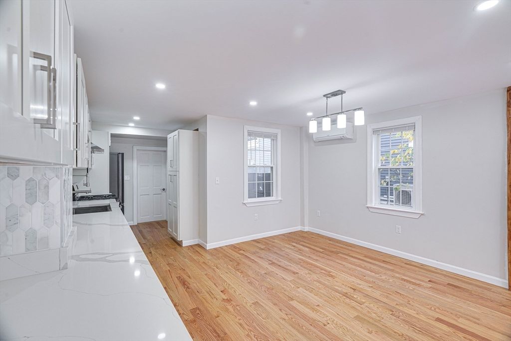 Empty room, Interior, Kitchen, Pendant Lights, Recessed Lighting, Wood Texture Flooring