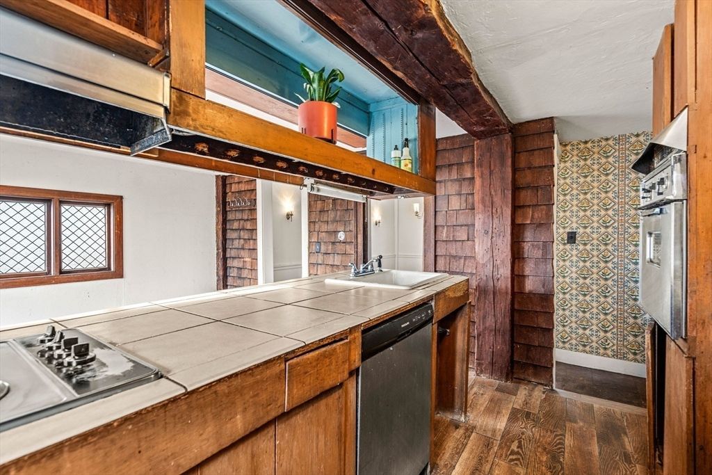 Interior, Kitchen, Stainless Steel Appliances, Tile Countertops, Wood Texture Flooring