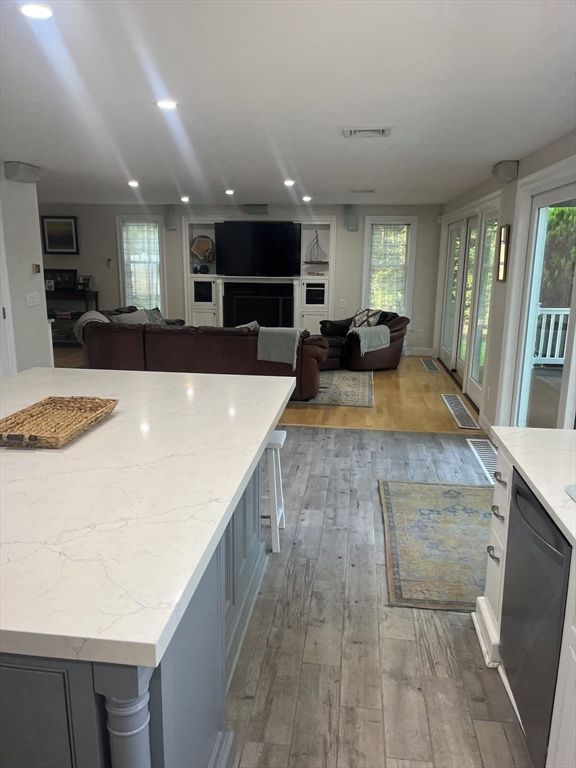 Fireplace, Interior, Kitchen, Living room, Recessed Lighting, Wood Texture Flooring