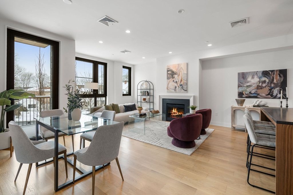 Dining room, Fireplace, Interior, Living room, Recessed Lighting, Wood Texture Flooring