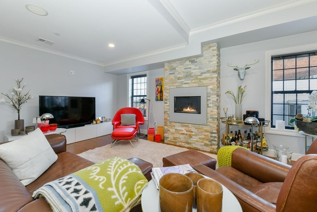 Fireplace, Interior, Living room, Recessed Lighting, Stone Walls, Wood Texture Flooring