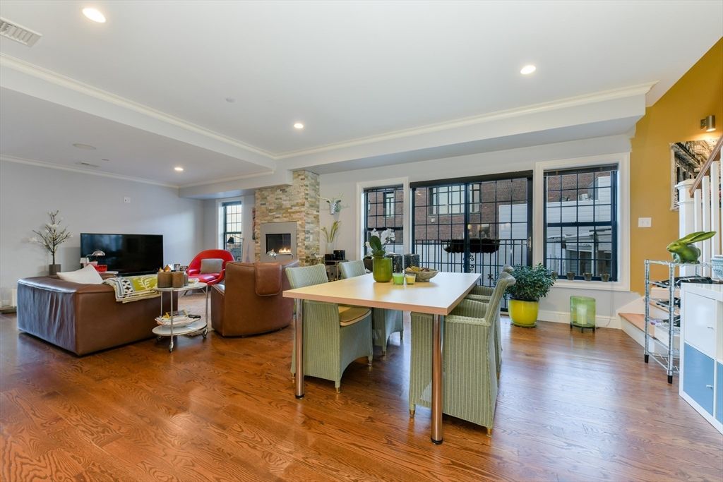 Dining room, Fireplace, Interior, Living room, Recessed Lighting, Wood Texture Flooring