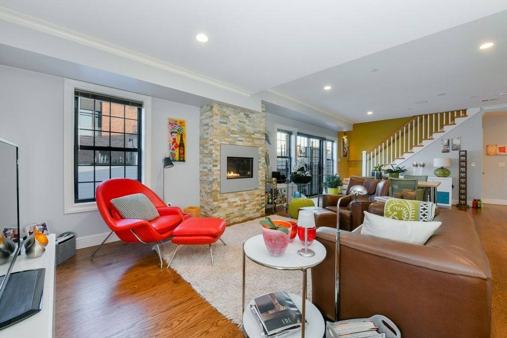 Fireplace, Interior, Living room, Recessed Lighting, Stone Walls, Wood Texture Flooring