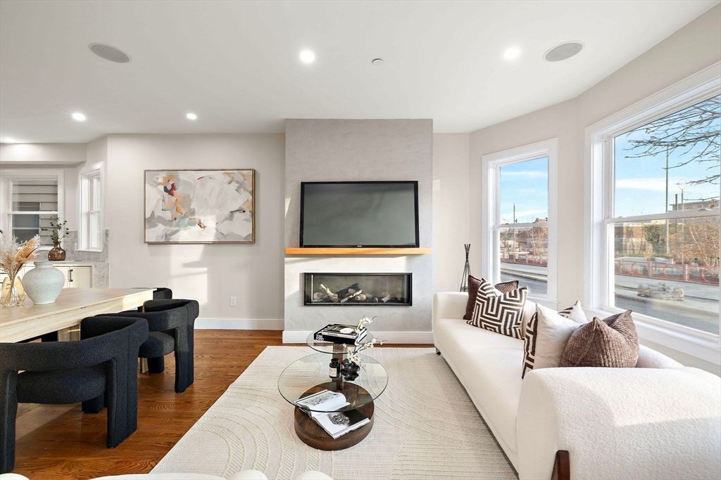 Dining room, Fireplace, Interior, Living room, Recessed Lighting, Wood Texture Flooring