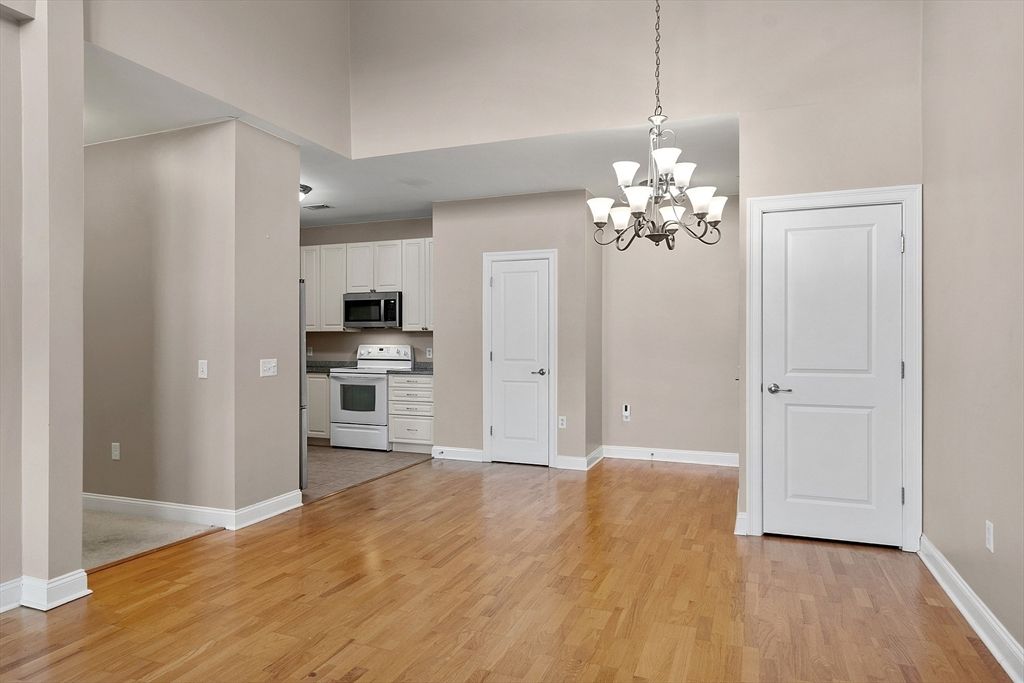 Chandelier, Empty room, Interior, Kitchen, Stainless Steel Appliances, Wood Texture Flooring