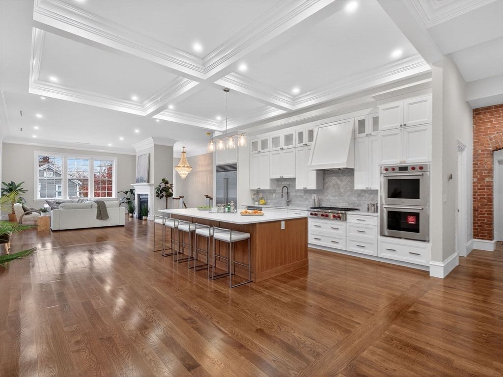 Interior, Kitchen, Living room, Pendant Lights, Recessed Lighting, Stainless Steel Appliances, Stone Walls, Wood Texture Flooring