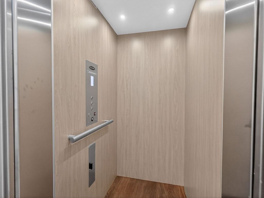 Elevator, Interior, Recessed Lighting, Wood Texture Flooring, Wooden Walls