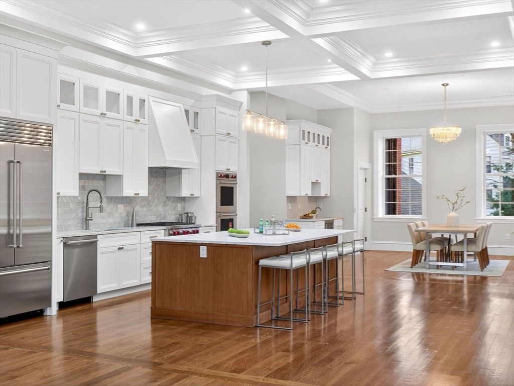 Chandelier, Dining room, Interior, Kitchen, Pendant Lights, Recessed Lighting, Stainless Steel Appliances, Wood Texture Flooring