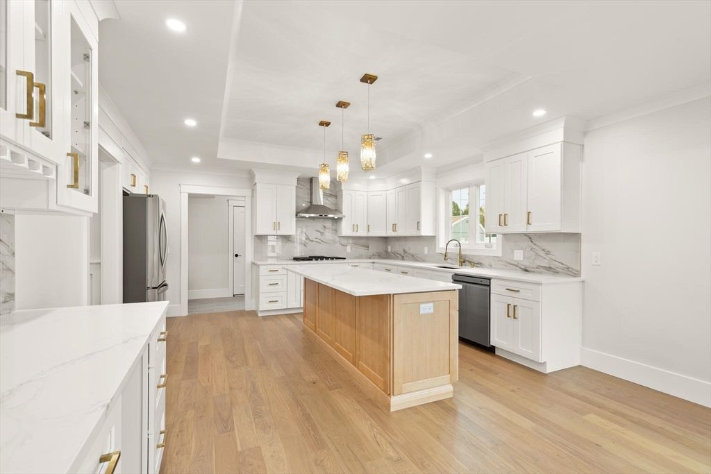 Interior, Kitchen, Marble Walls, Pendant Lights, Recessed Lighting, Stainless Steel Appliances, Wood Texture Flooring