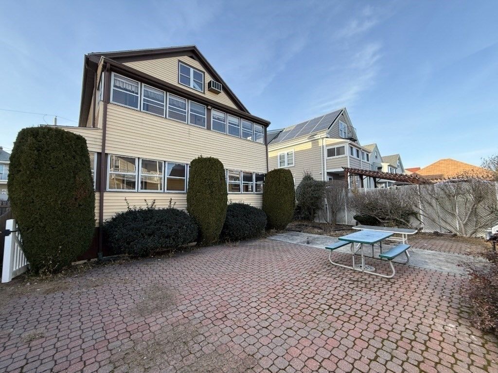 Exterior, Pool, Solar Panels