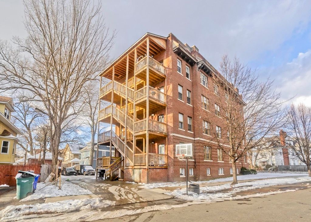 Exterior, Facade, Brick Facade, Condo Building