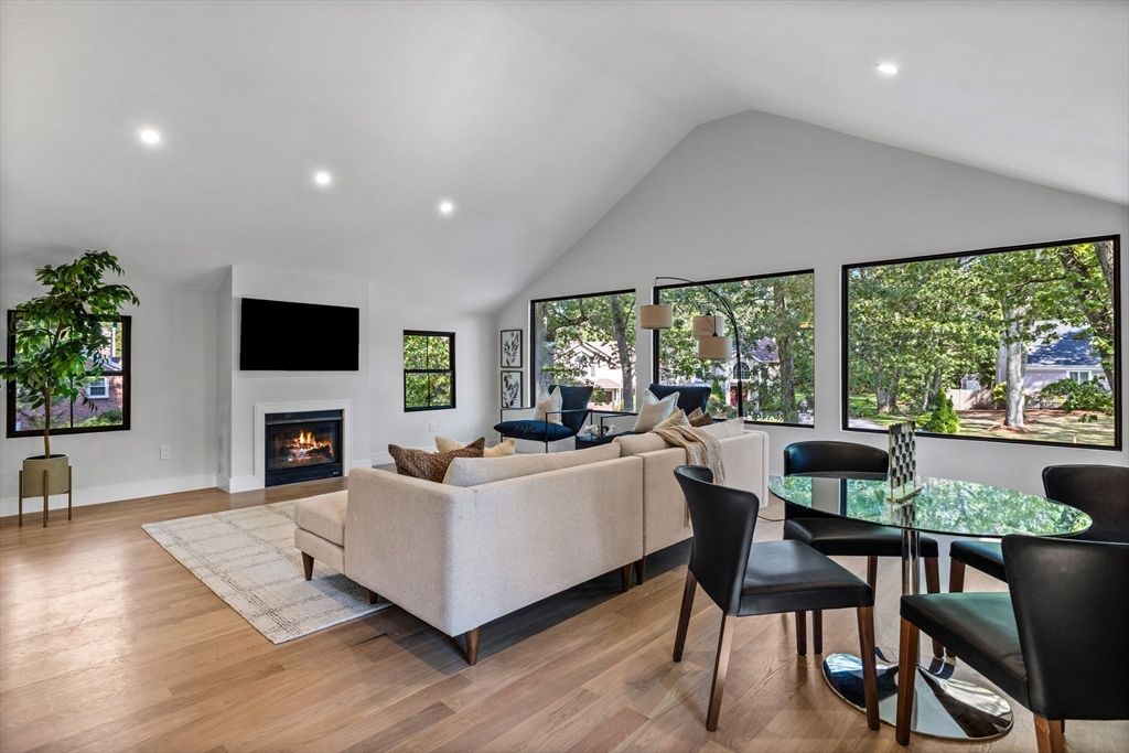 Dining room, Fireplace, Interior, Living room, Recessed Lighting, Wood Texture Flooring