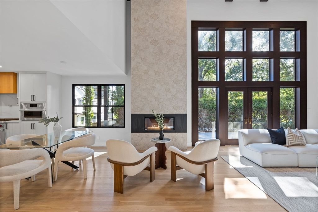 Dining room, Fireplace, Interior, Kitchen, Living room, Recessed Lighting, Stone Walls, Wood Texture Flooring