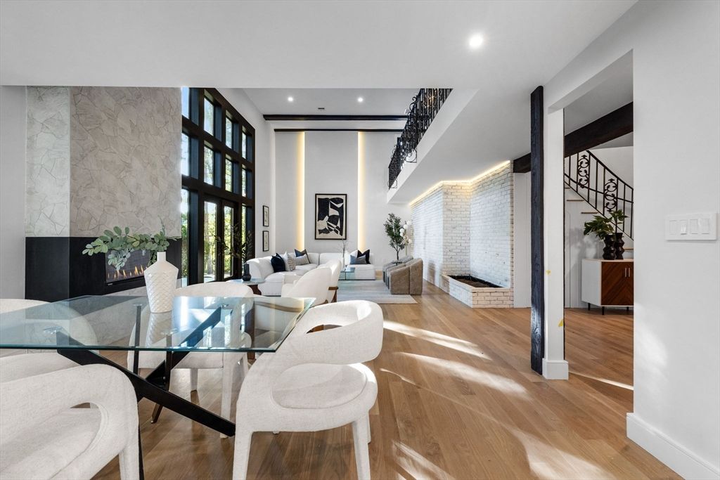 Dining room, Fireplace, Interior, Living room, Recessed Lighting, Wood Texture Flooring