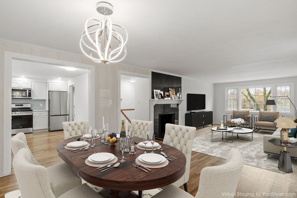 Dining room, Fireplace, Interior, Kitchen, Living room, Pendant Lights, Stainless Steel Appliances, Wood Texture Flooring