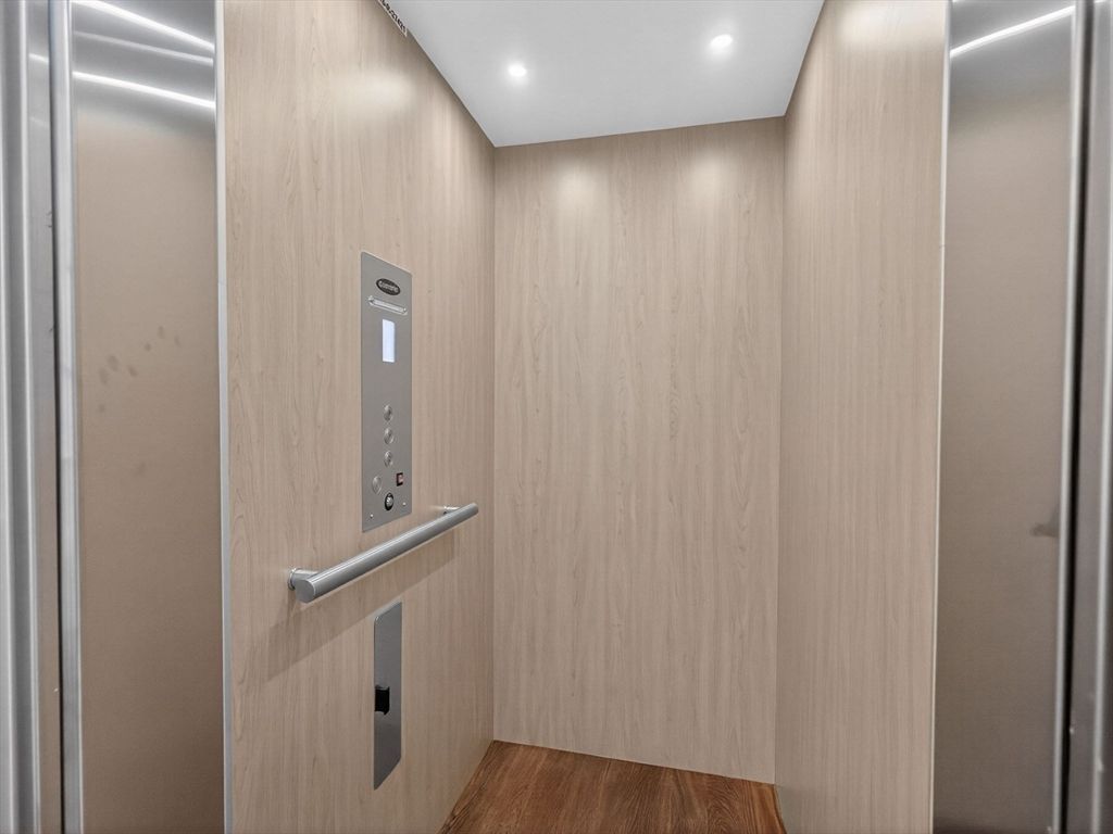 Elevator, Interior, Recessed Lighting, Wood Texture Flooring, Wooden Walls