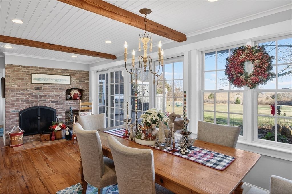 Chandelier, Dining room, Fireplace, Interior, Recessed Lighting, Stone Walls, Wooden Beams, Wood Texture Flooring