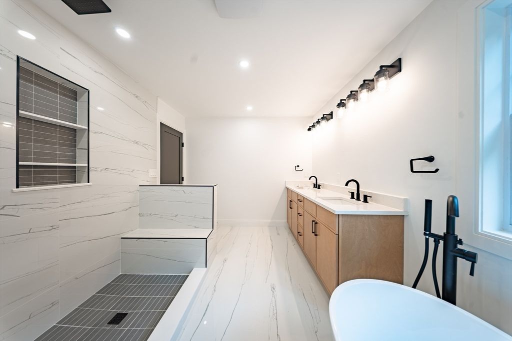 Bathroom, Dual Sink Vanities, Interior, Marble, Marble Walls, Recessed Lighting