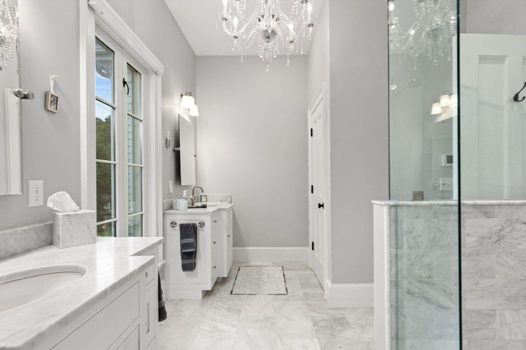 Bathroom, Chandelier, Dual Sink Vanities, Glass Shower, Interior, Marble, Marble Walls