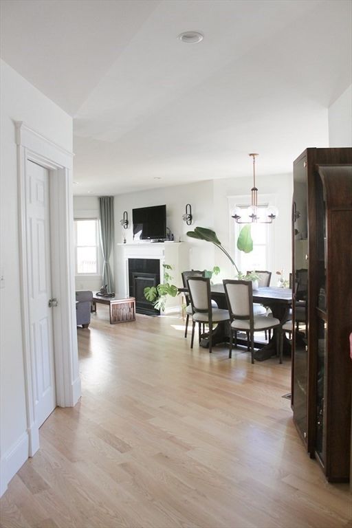 Dining room, Fireplace, Interior, Pendant Lights, Wood Texture Flooring
