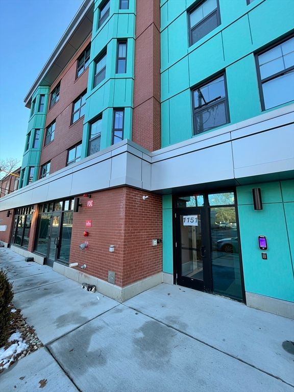 Exterior, Facade, Brick Facade, Condo Building