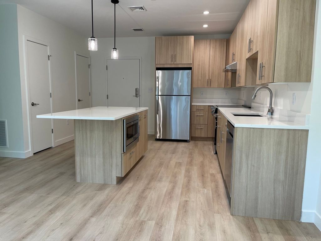 Interior, Kitchen, Pendant Lights, Recessed Lighting, Stainless Steel Appliances, Wood Texture Flooring