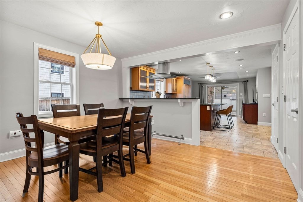 Chandelier, Dining room, Interior, Kitchen, Pendant Lights, Recessed Lighting, Stainless Steel Appliances, Wood Texture Flooring