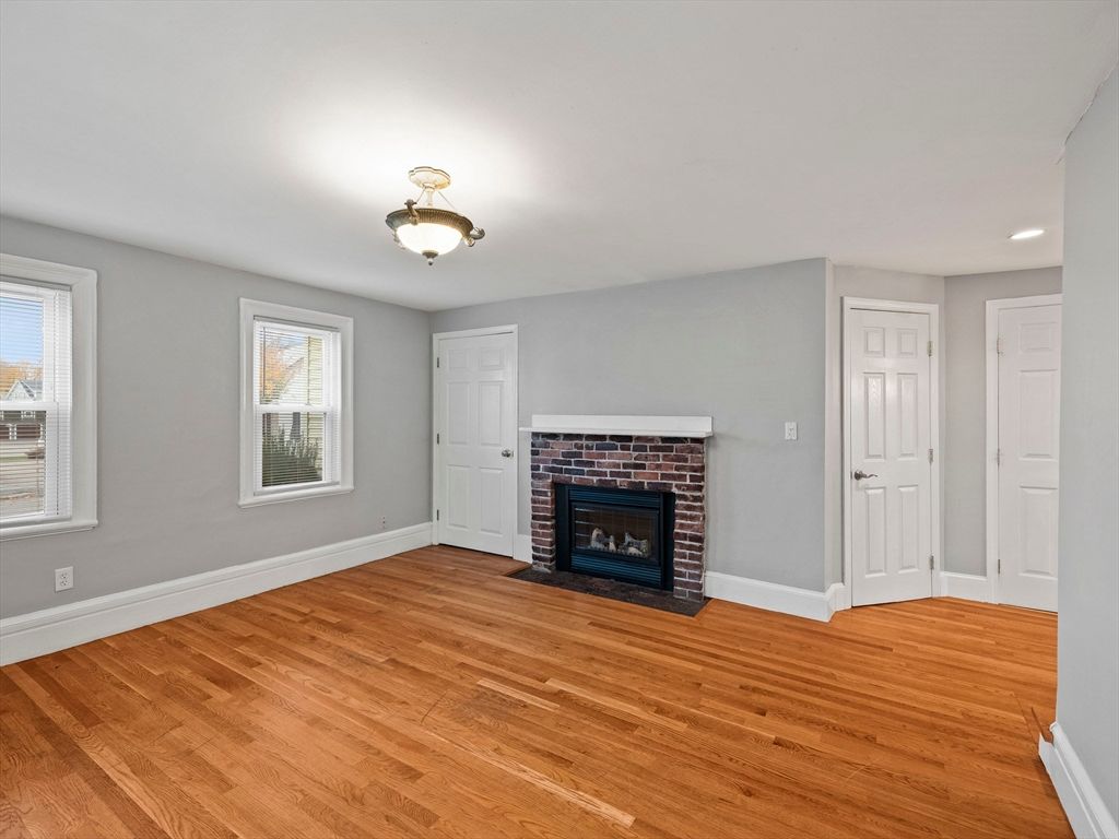 Empty room, Fireplace, Interior, Recessed Lighting, Wood Texture Flooring