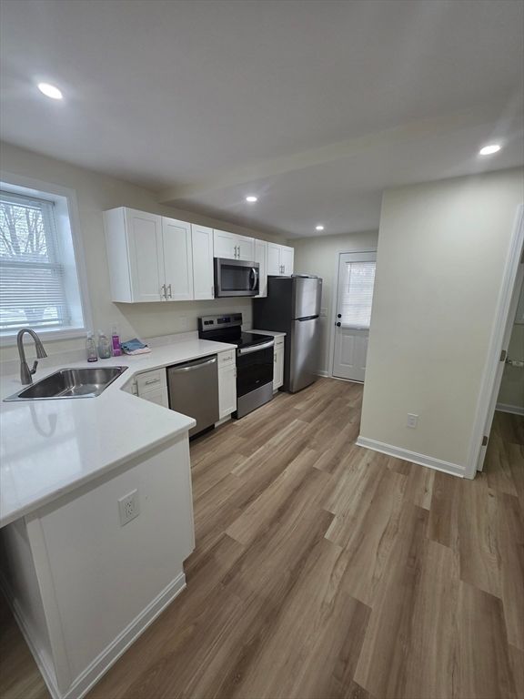 Interior, Kitchen, Recessed Lighting, Stainless Steel Appliances, Wood Texture Flooring