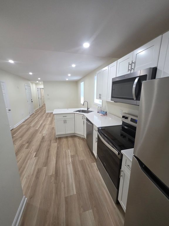 Interior, Kitchen, Recessed Lighting, Stainless Steel Appliances, Wood Texture Flooring