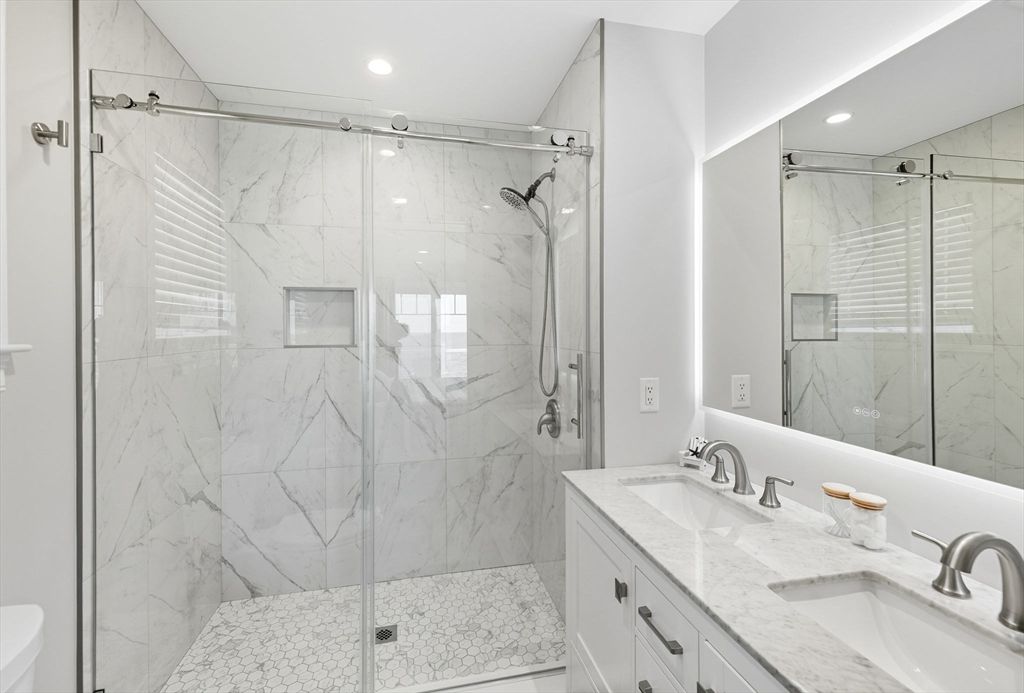 Bathroom, Dual Sink Vanities, Glass Shower, Interior, Marble Walls, Recessed Lighting