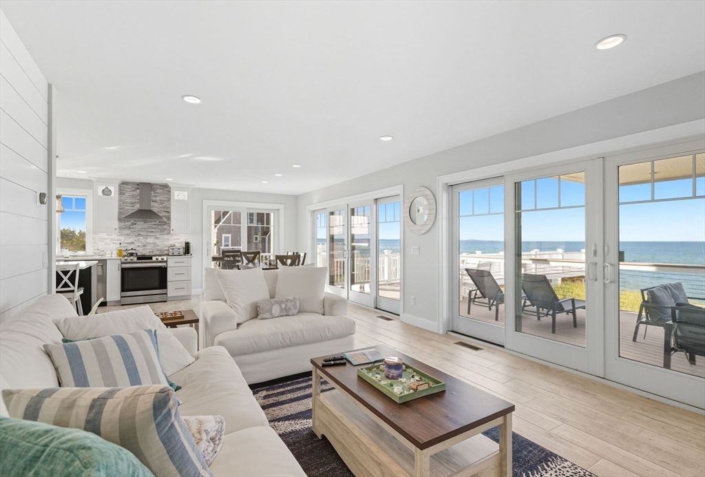 Dining room, Interior, Kitchen, Living room, Recessed Lighting, Stone Walls, Water, Wood Texture Flooring