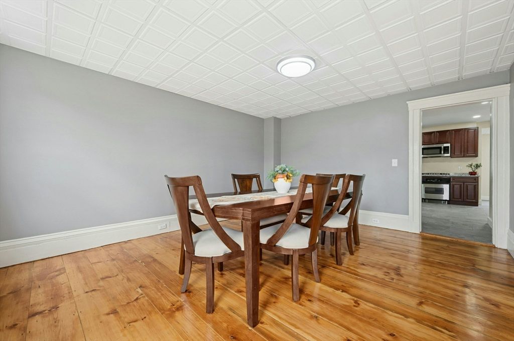 Dining room, Interior, Kitchen, Recessed Lighting, Stainless Steel Appliances, Wood Texture Flooring