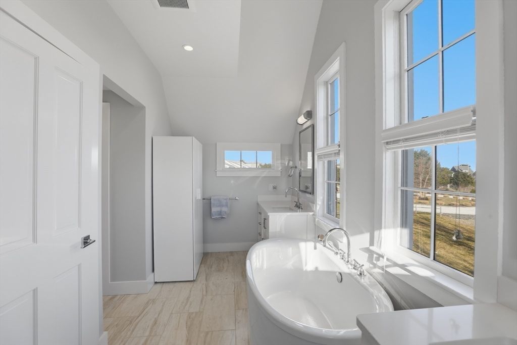 Bathroom, Dual Sink Vanities, Free Standing Baths, Interior, Recessed Lighting, Wood Texture Flooring