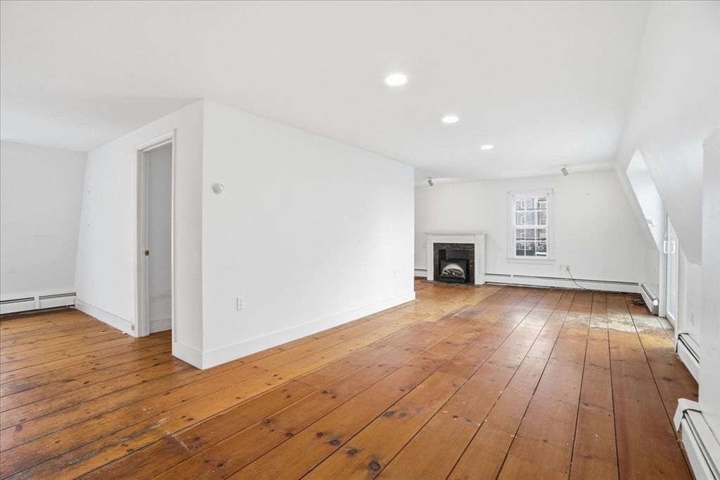 Empty room, Fireplace, Interior, Recessed Lighting, Wood Texture Flooring