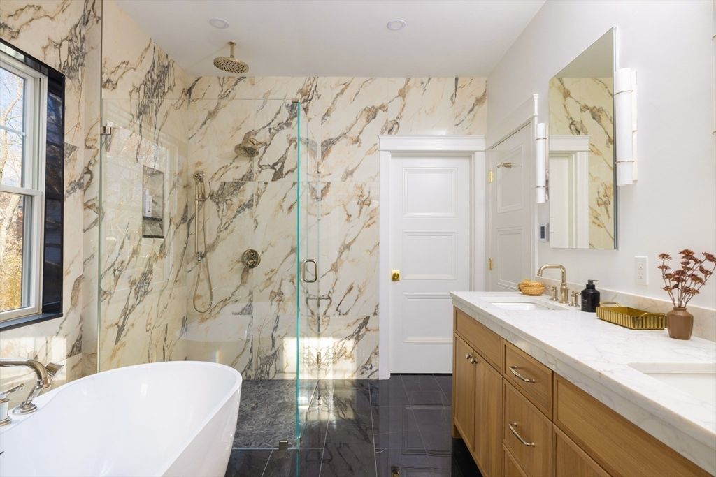 Bathroom, Dual Sink Vanities, Free Standing Baths, Glass Shower, Interior, Marble Walls, Recessed Lighting