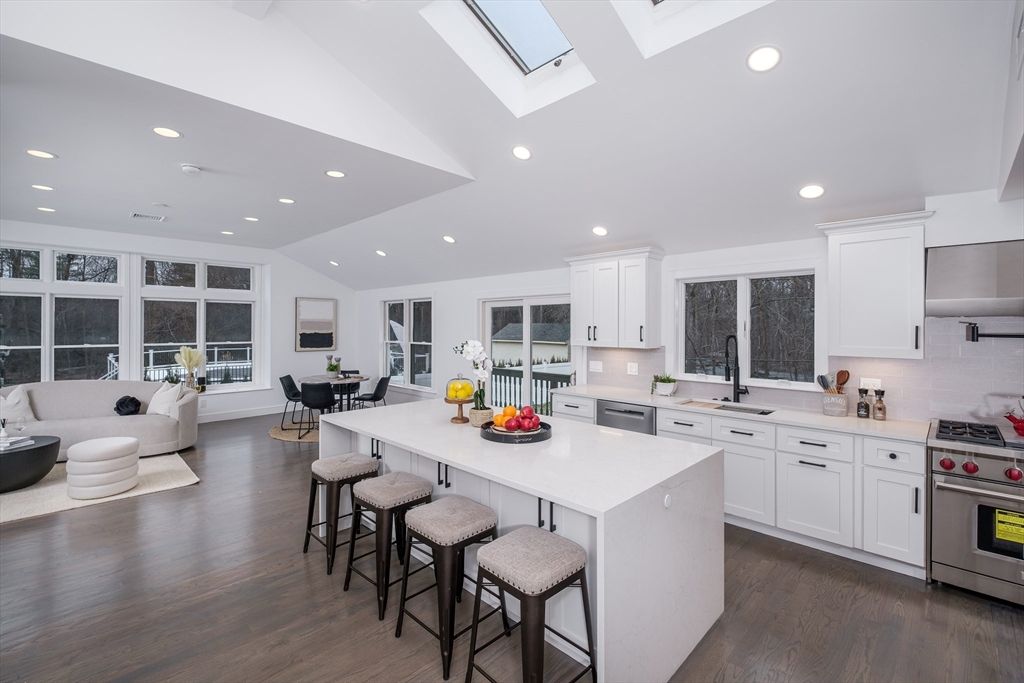 Dining room, Interior, Kitchen, Living room, Recessed Lighting, Stainless Steel Appliances, Wood Texture Flooring