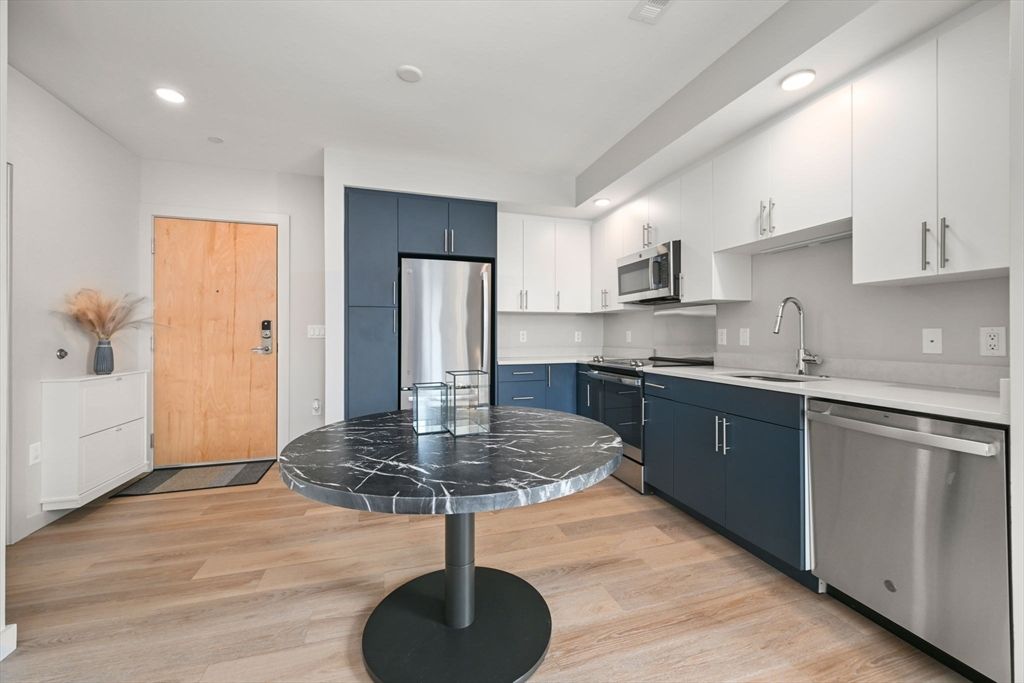 Interior, Kitchen, Recessed Lighting, Stainless Steel Appliances, Wood Texture Flooring