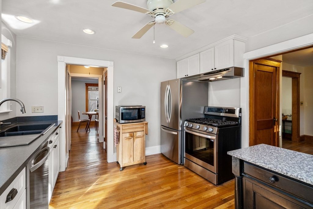 Dining room, Interior, Kitchen, Recessed Lighting, Stainless Steel Appliances, Wood Texture Flooring