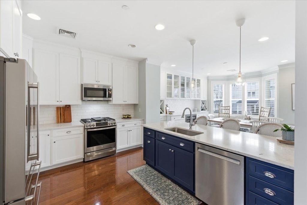 Dining room, Interior, Kitchen, Pendant Lights, Recessed Lighting, Stainless Steel Appliances, Wood Texture Flooring