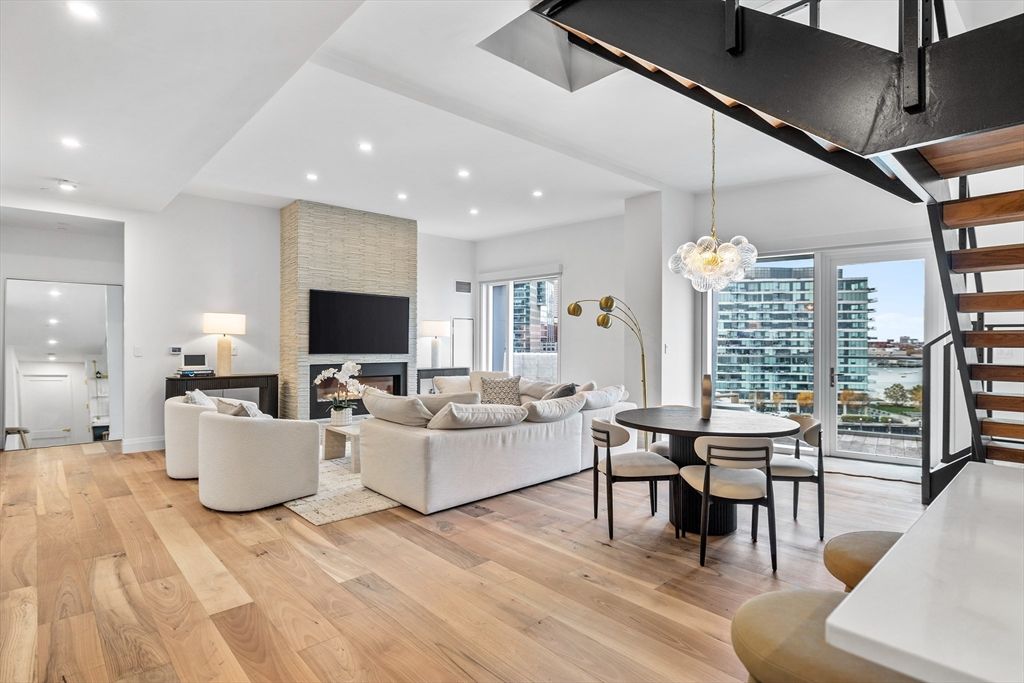 Dining room, Fireplace, Interior, Living room, Pendant Lights, Recessed Lighting, Stone Walls, Wood Texture Flooring