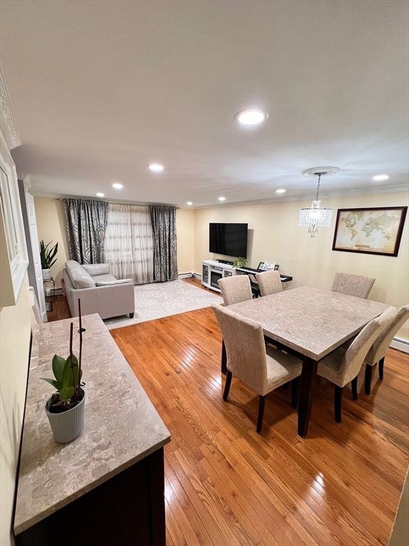 Chandelier, Dining room, Interior, Living room, Pendant Lights, Recessed Lighting, Wood Texture Flooring